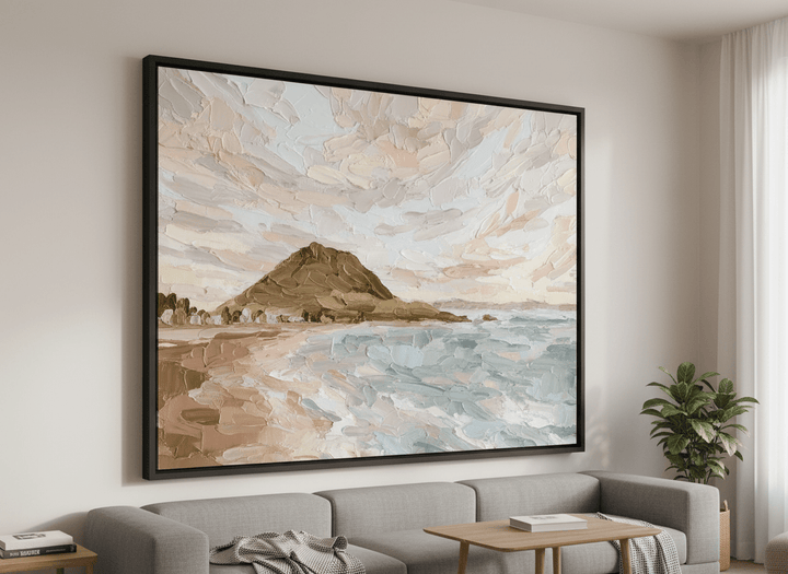 Modern wall art styled above a sofa in a neutral living room