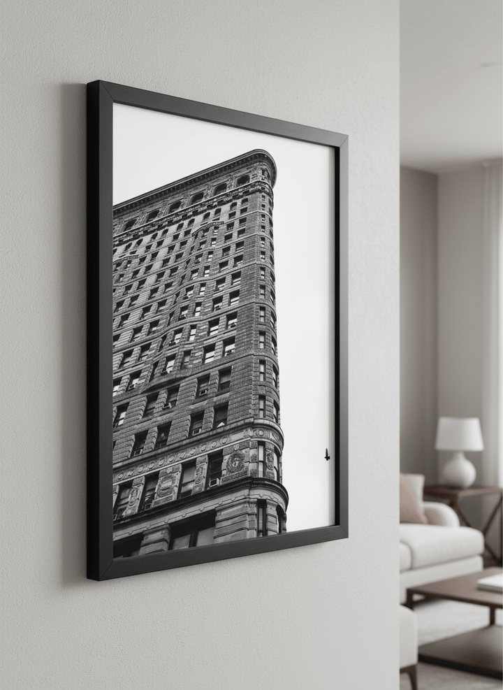 Modern wall art styled above a sofa in a neutral living room