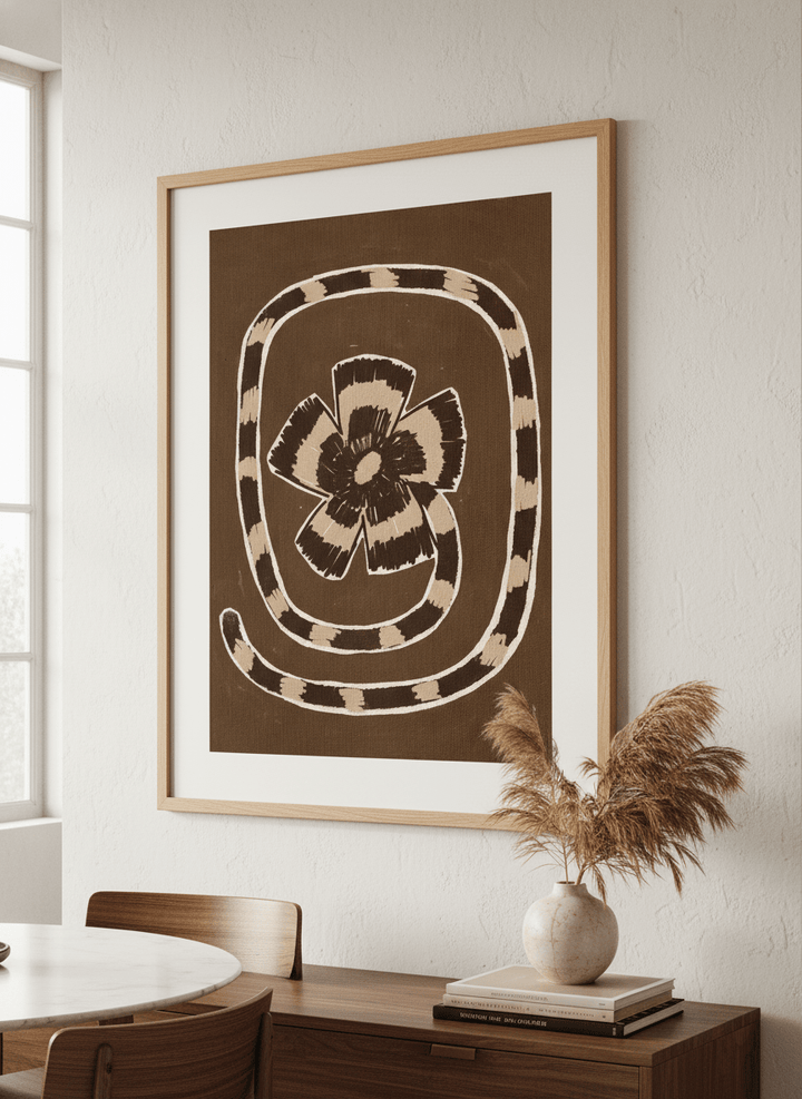 Wall art styled above a dining table in a contemporary home