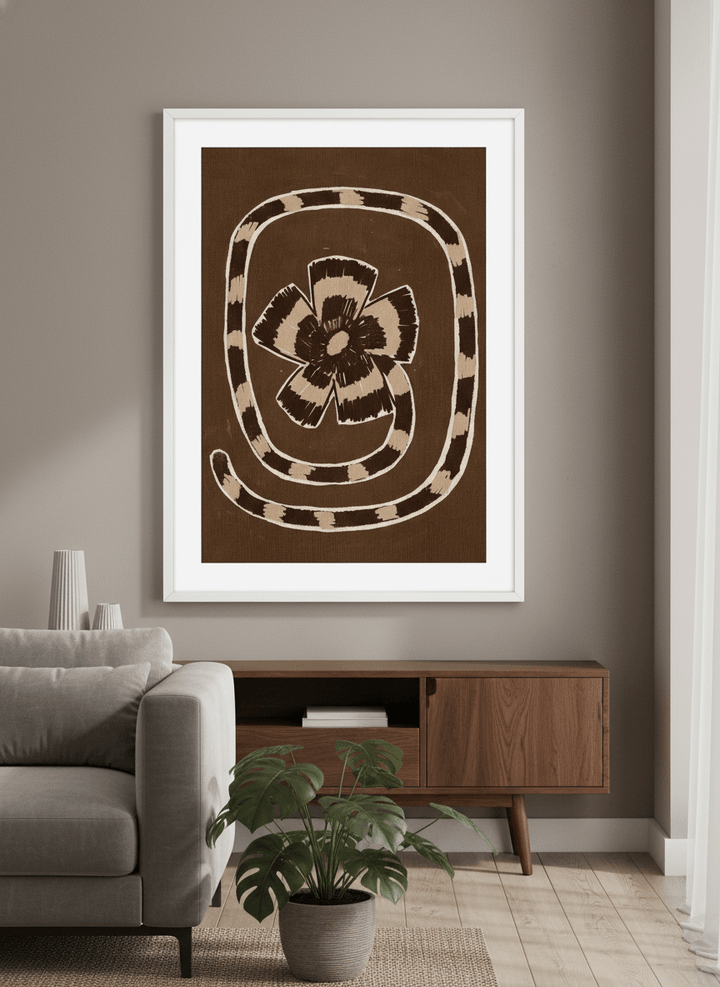 Modern wall art styled above a sofa in a neutral living room