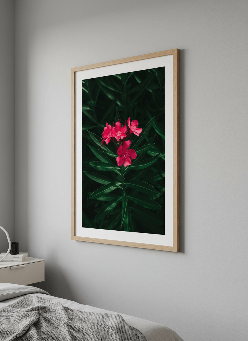 Minimalist artwork displayed in a calm, light-filled bedroom interior