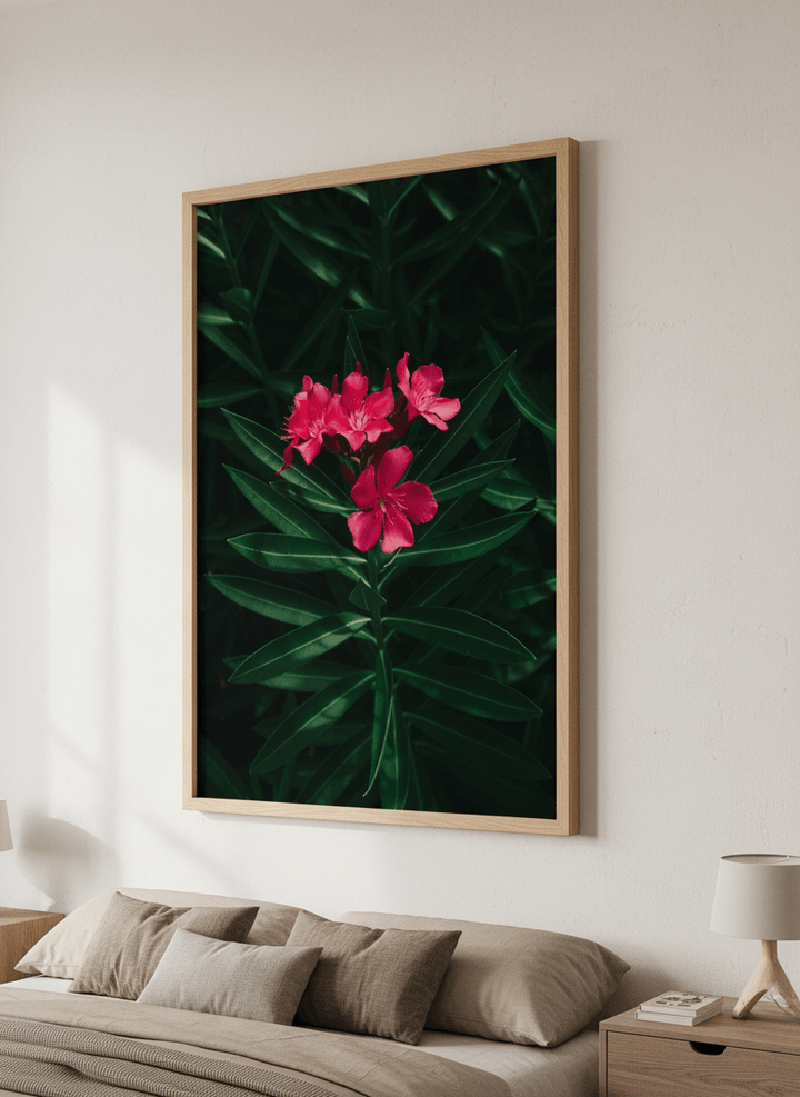 Minimalist artwork displayed in a calm, light-filled bedroom interior