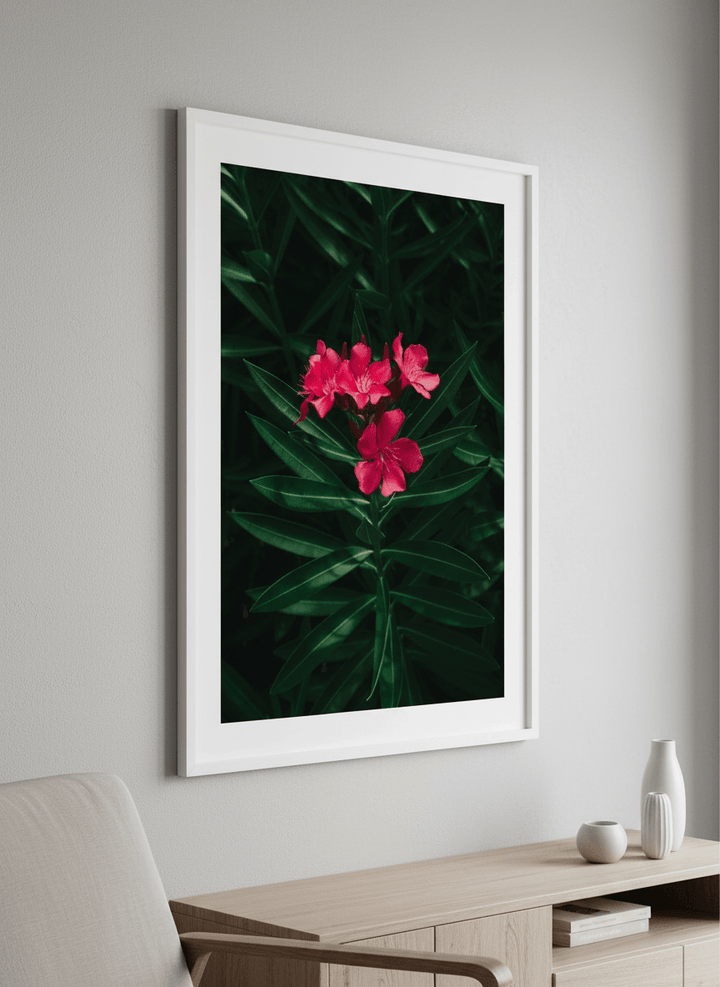 Modern wall art styled above a sofa in a neutral living room