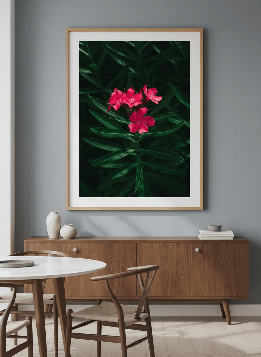 Wall art styled above a dining table in a contemporary home