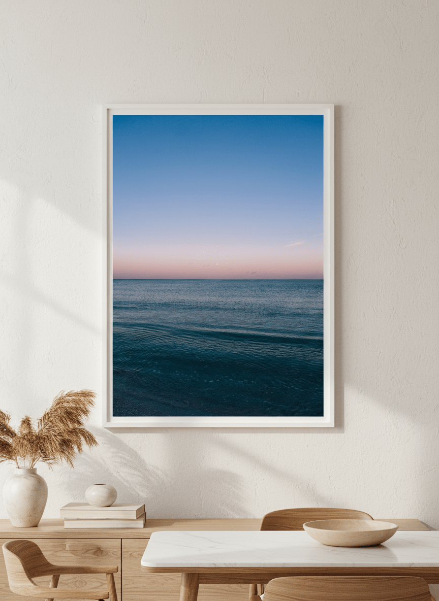 Wall art styled above a dining table in a contemporary home