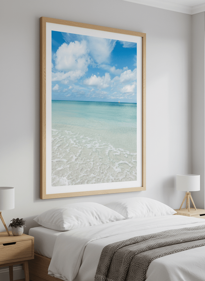 Minimalist artwork displayed in a calm, light-filled bedroom interior