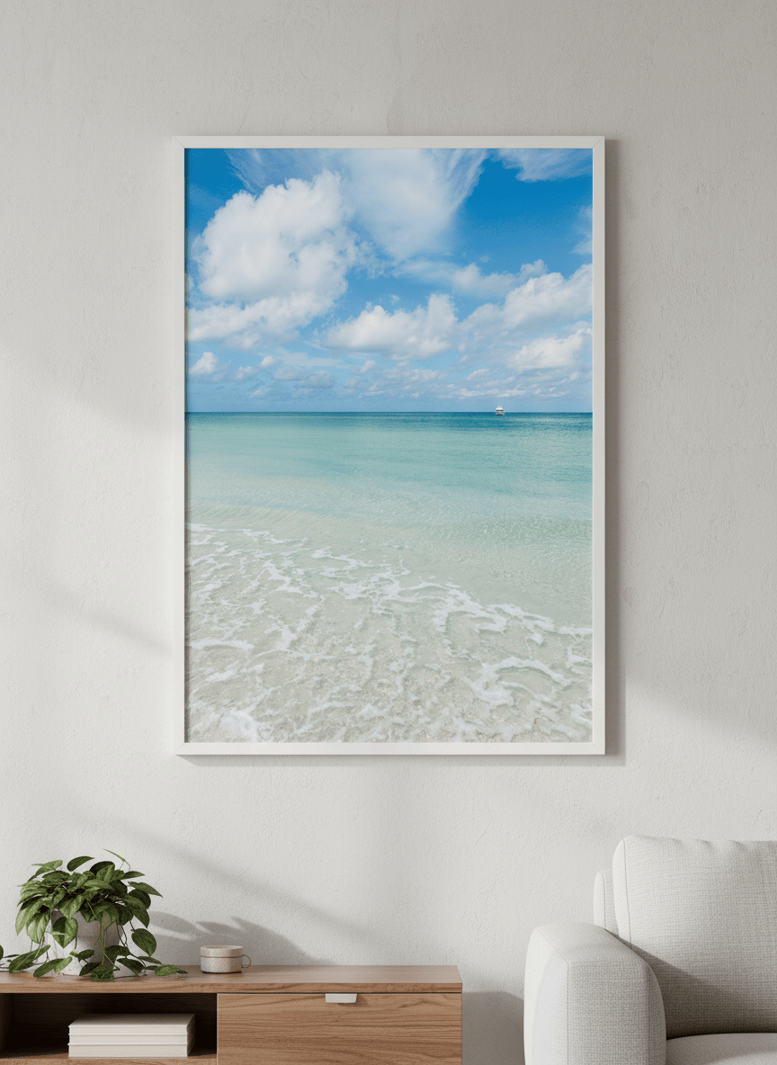 Modern wall art styled above a sofa in a neutral living room