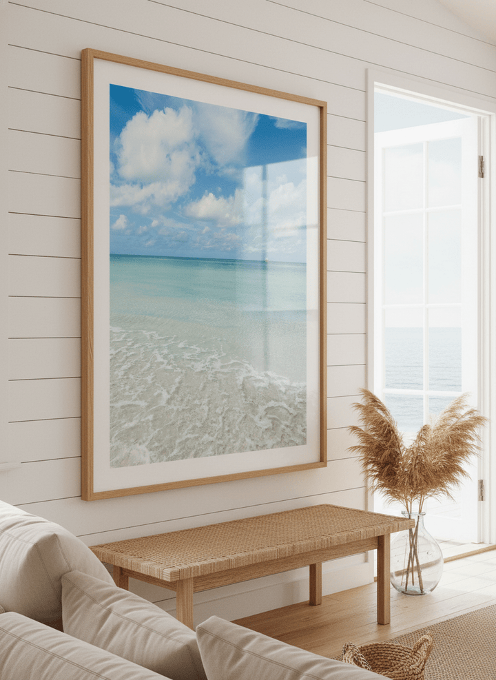 Neutral wall art displayed in a sunny coastal beach house