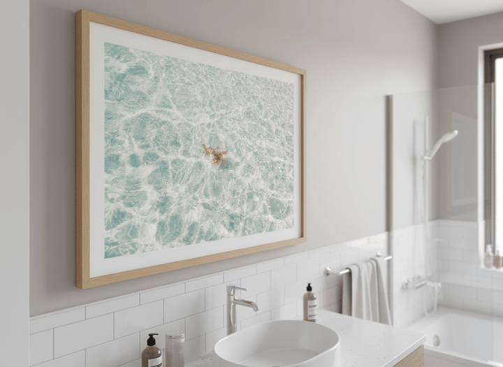 Modern print displayed in a clean minimalist bathroom setting