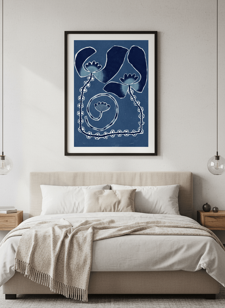 Minimalist artwork displayed in a calm, light-filled bedroom interior