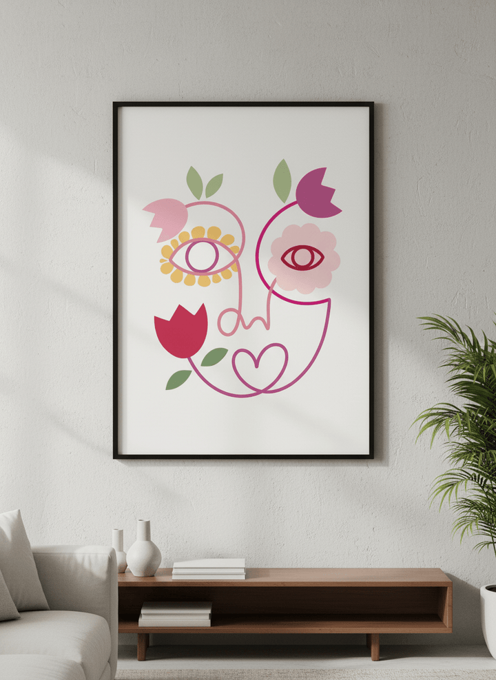 Modern wall art styled above a sofa in a neutral living room