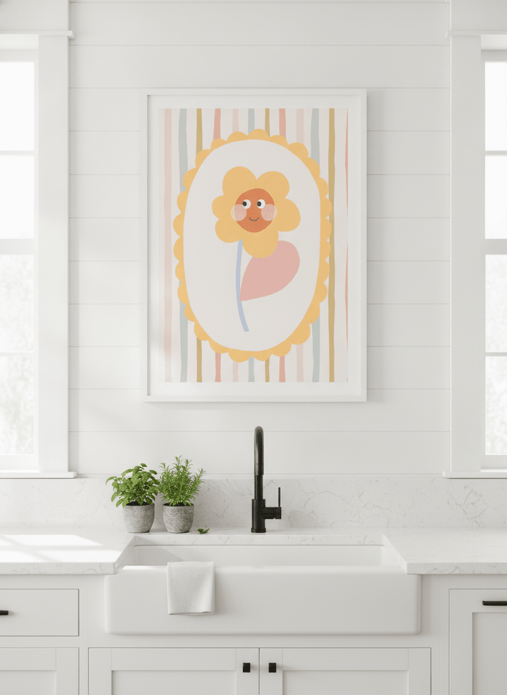 Artwork styled on the wall of a bright modern kitchen