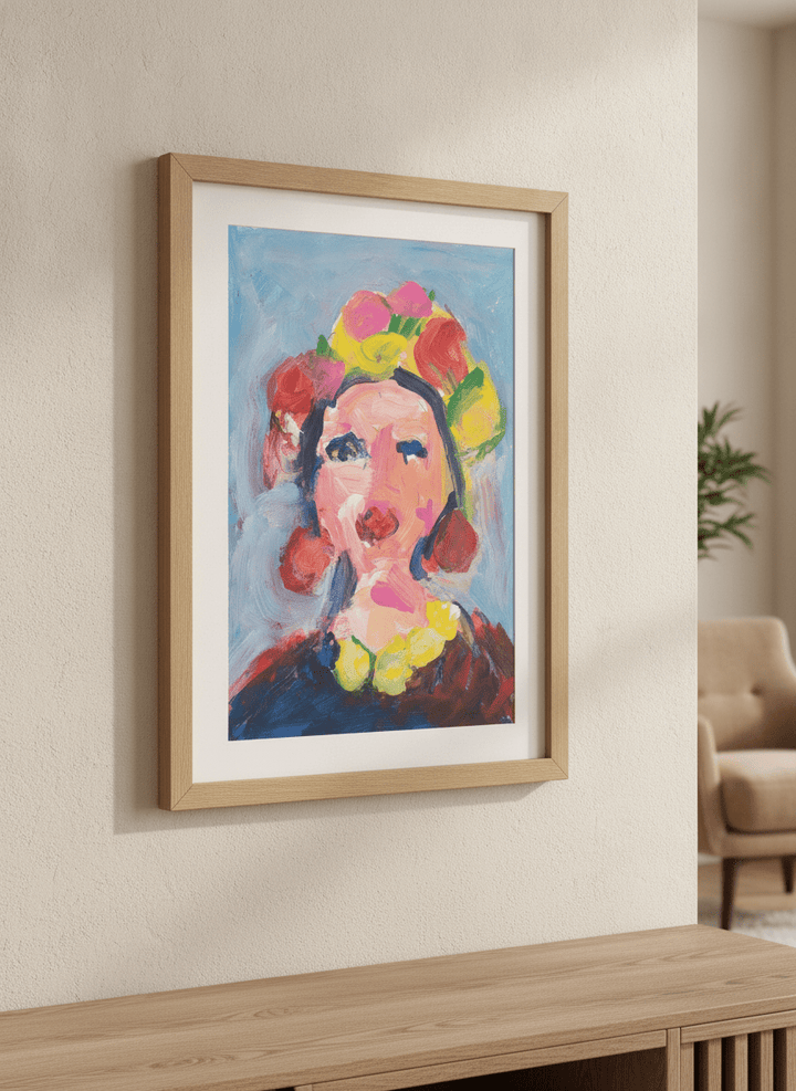 Modern wall art styled above a sofa in a neutral living room