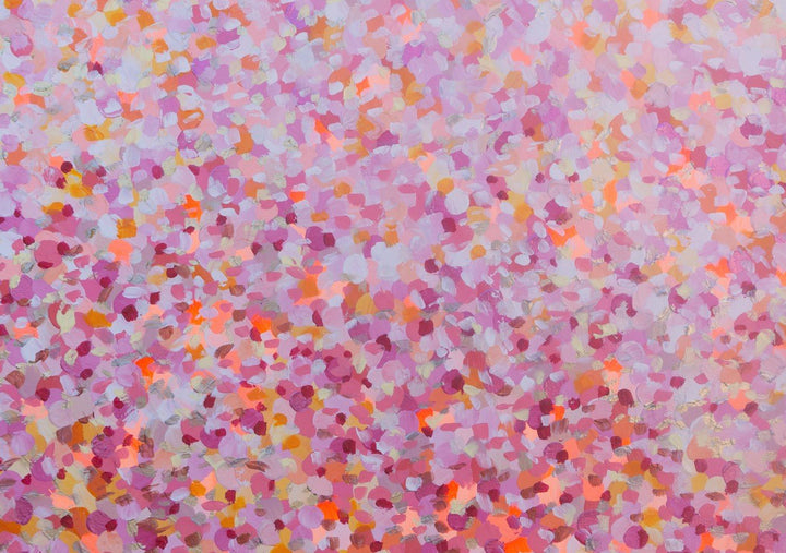 Multicolored confetti pattern on a pink background framed