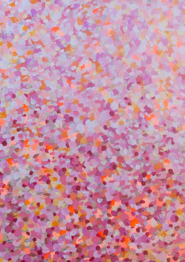 Multicolored confetti pattern on a textured background framed