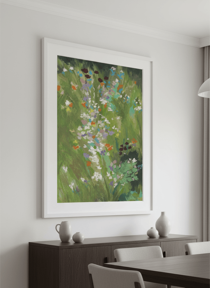 Wall art styled above a dining table in a contemporary home