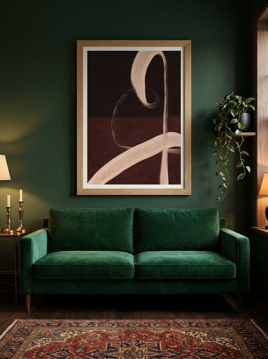 Modern wall art print styled on the wall in a moody living room
