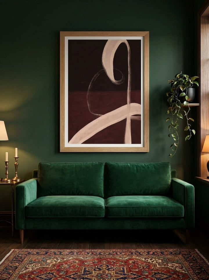 Modern wall art print styled on the wall in a moody living room