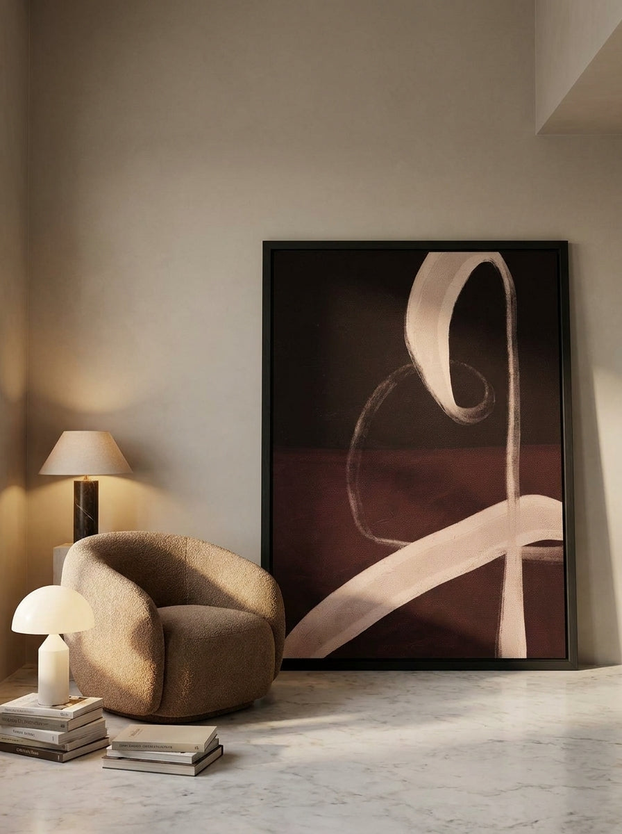 Oversized statement modern wall art print leaning against the wall in a luxe home office