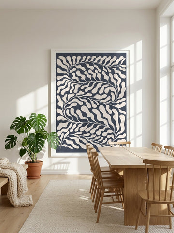 Oversized statement modern wall art print styled on the wall in a bright Scandinavian dining room