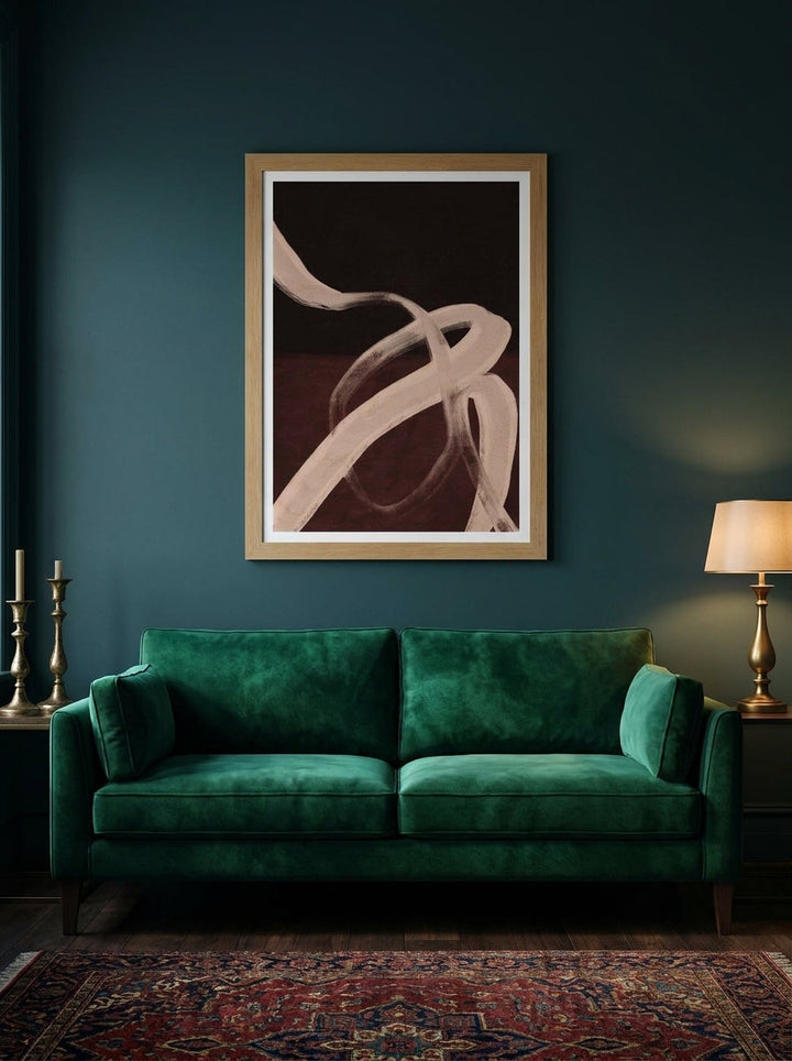 Modern wall art print styled on the wall in a moody living room