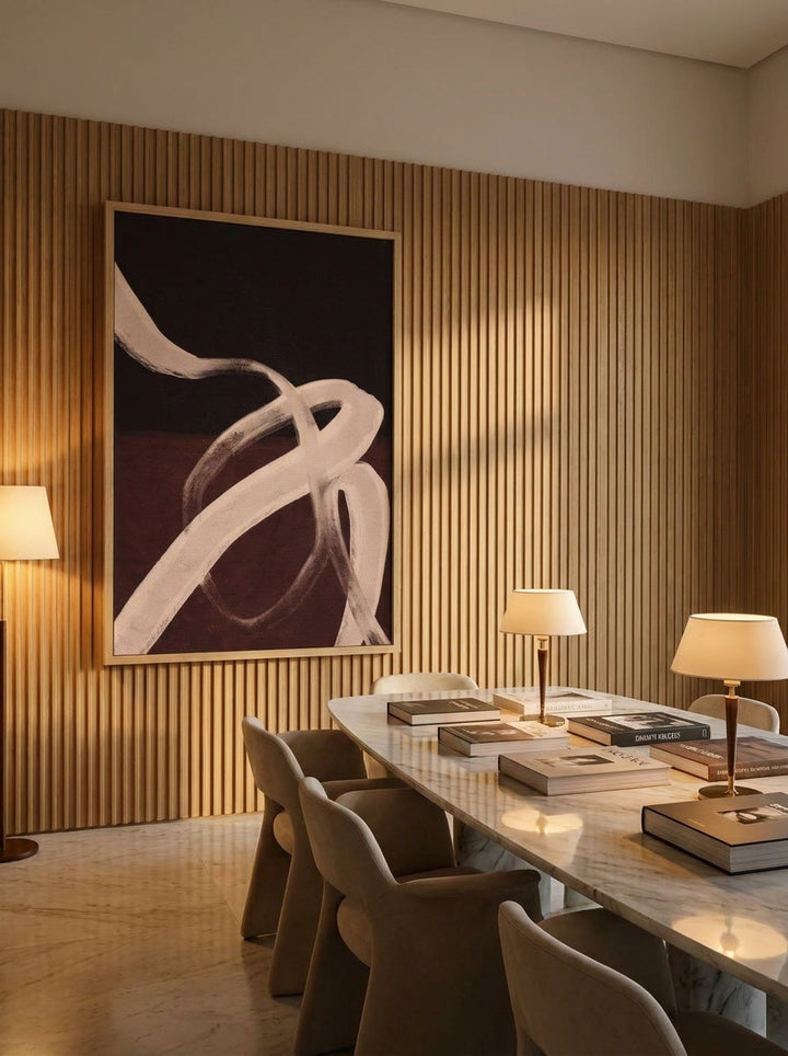 Oversized statement modern wall art print styled on the wall in a luxe dining room