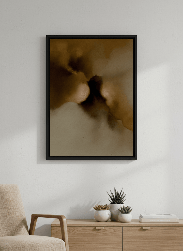 Modern wall art styled above a sofa in a neutral living room