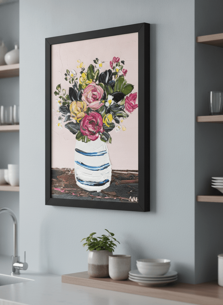 Artwork styled on the wall of a bright modern kitchen