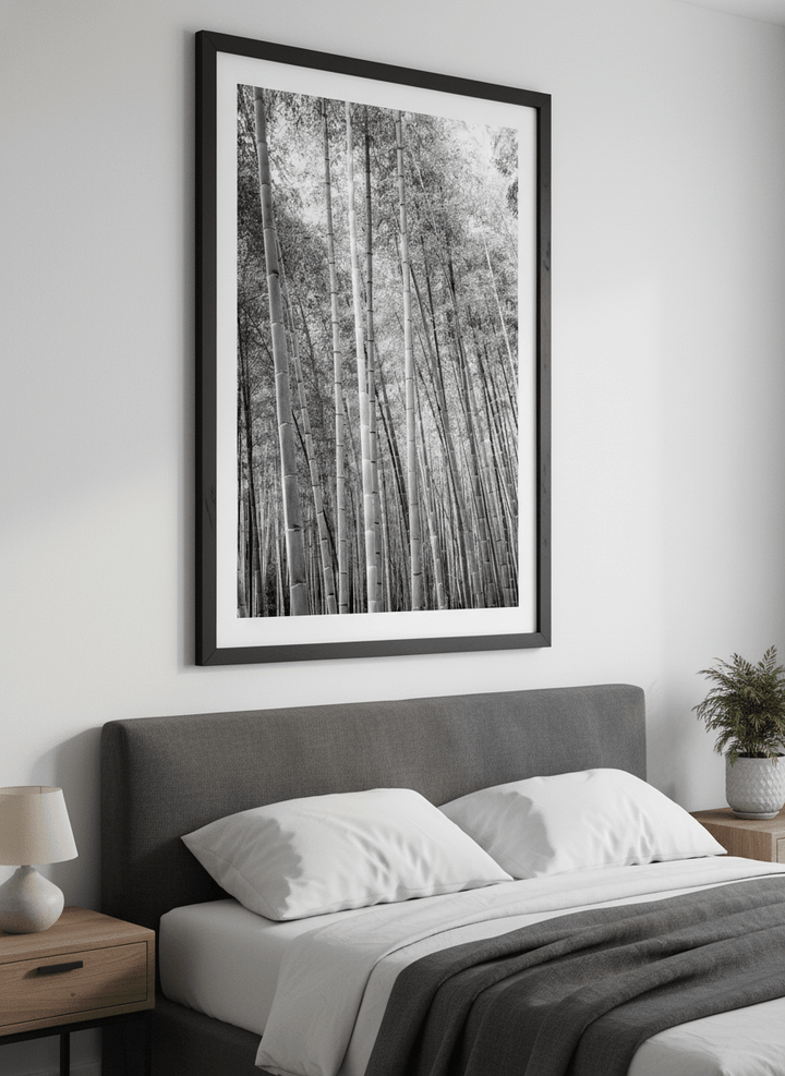 Minimalist artwork displayed in a calm, light-filled bedroom interior