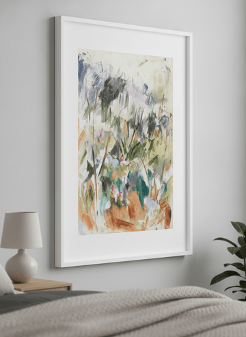 Minimalist artwork displayed in a calm, light-filled bedroom interior