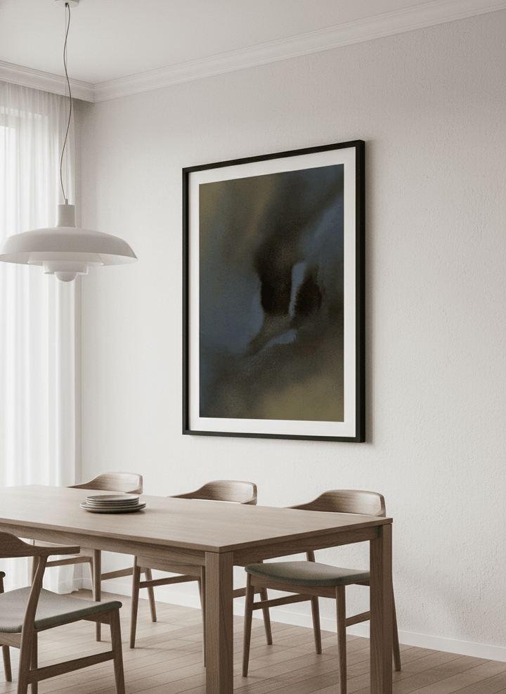 Wall art styled above a dining table in a contemporary home