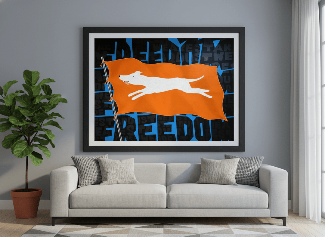 Modern wall art styled above a sofa in a neutral living room
