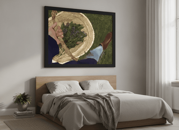 Minimalist artwork displayed in a calm, light-filled bedroom interior