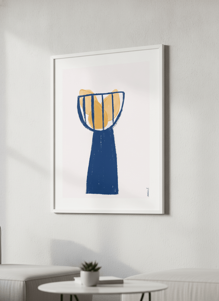 Modern wall art styled above a sofa in a neutral living room