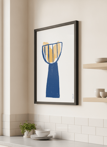 Artwork styled on the wall of a bright modern kitchen