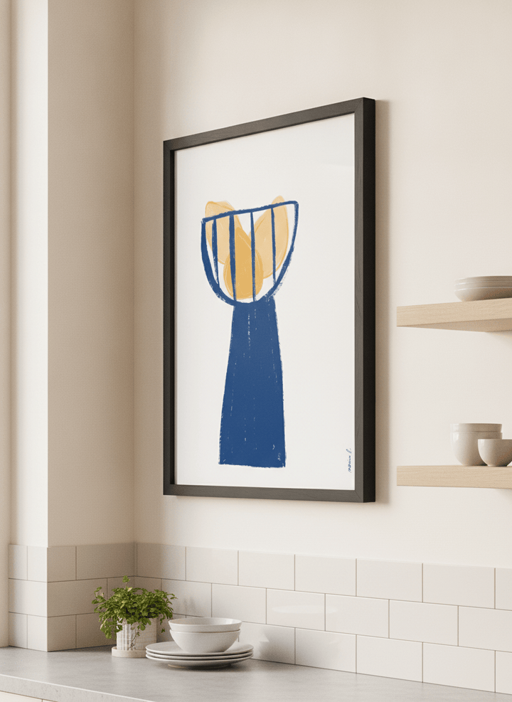 Artwork styled on the wall of a bright modern kitchen