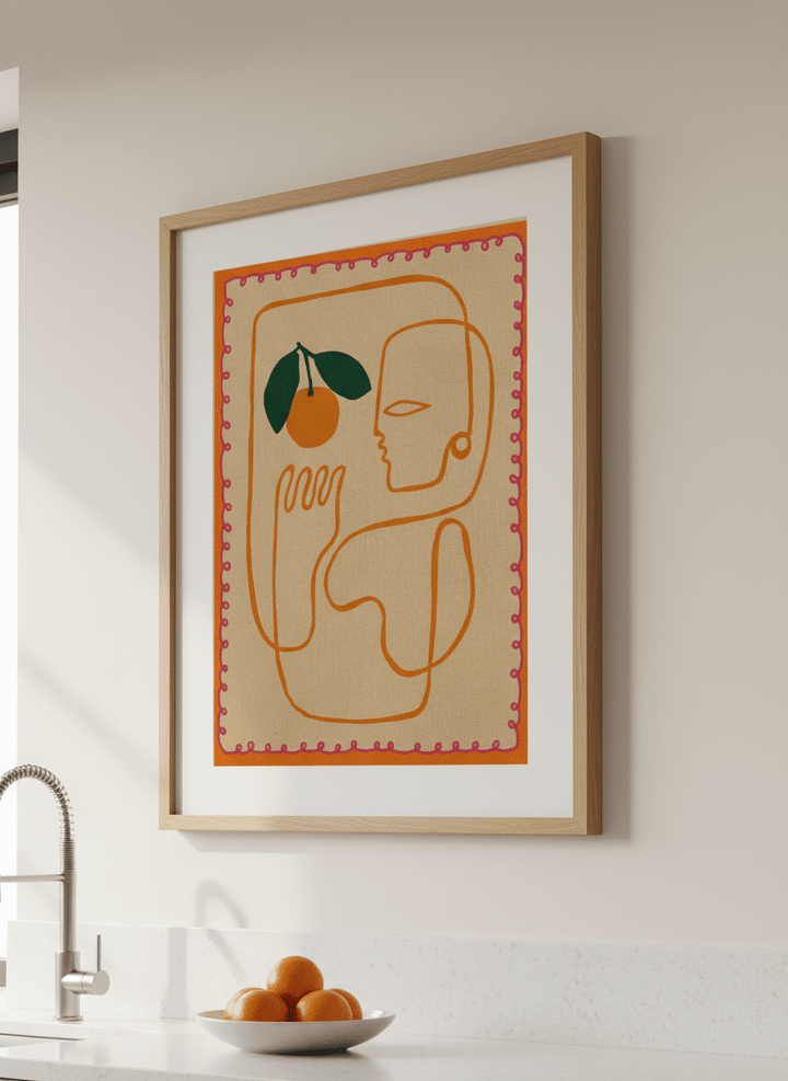 Artwork styled on the wall of a bright modern kitchen