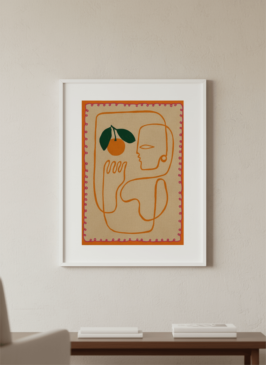 Modern wall art styled above a sofa in a neutral living room