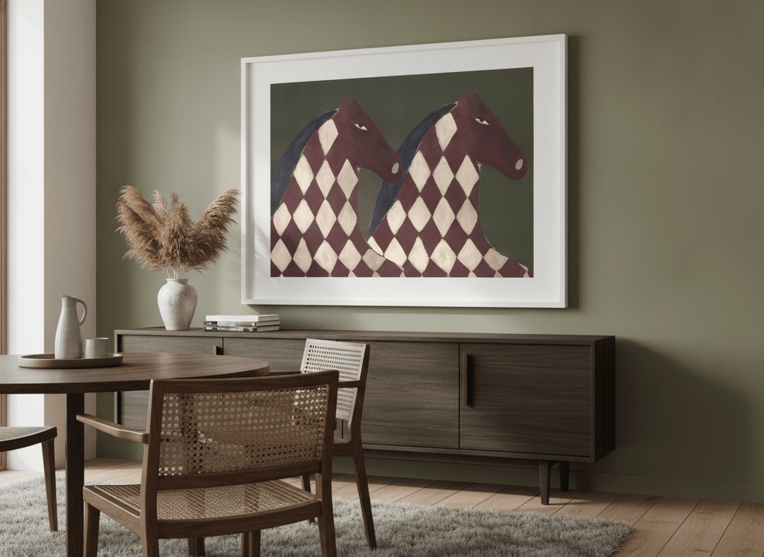 Wall art styled above a dining table in a contemporary home