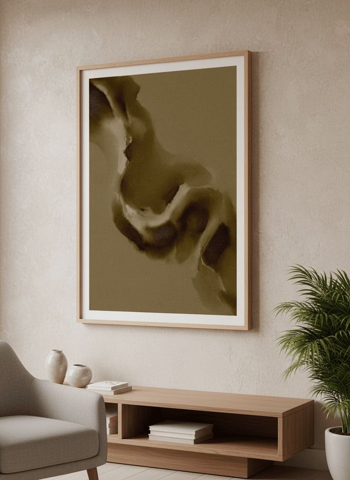 Modern wall art styled above a sofa in a neutral living room