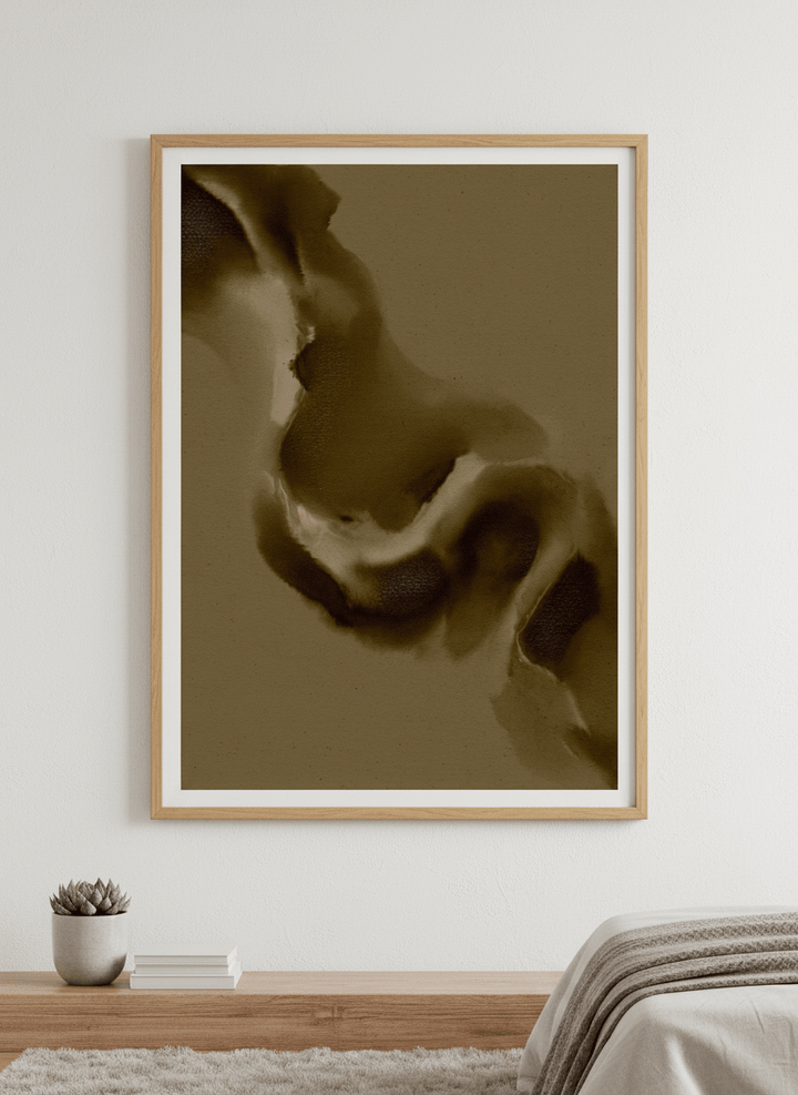 Minimalist artwork displayed in a calm, light-filled bedroom interior