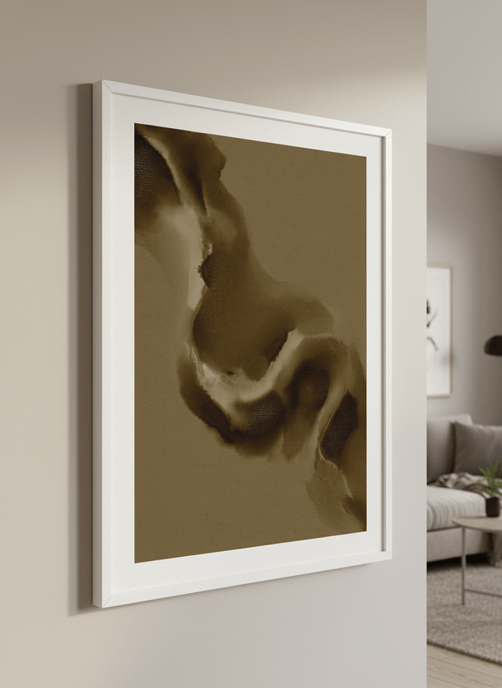 Modern wall art styled above a sofa in a neutral living room