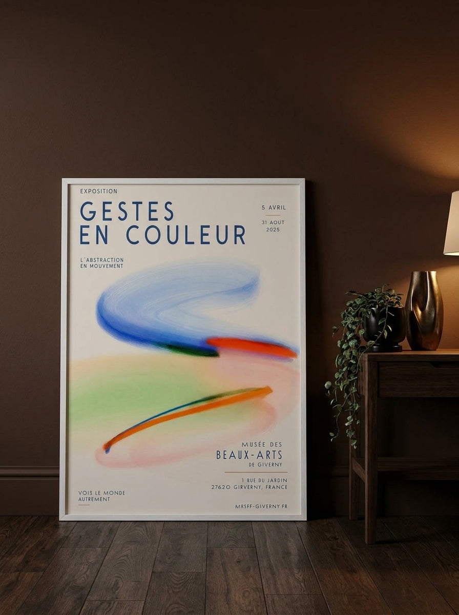 Modern wall art print leaning against the wall in a moody bedroom