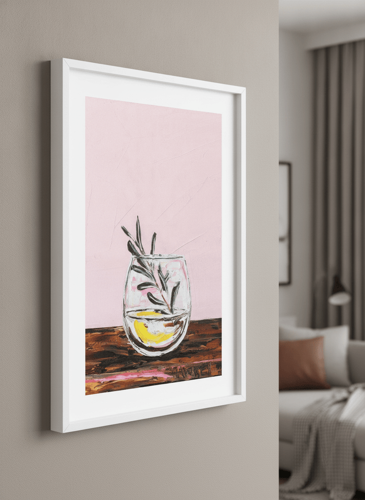 Modern wall art styled above a sofa in a neutral living room