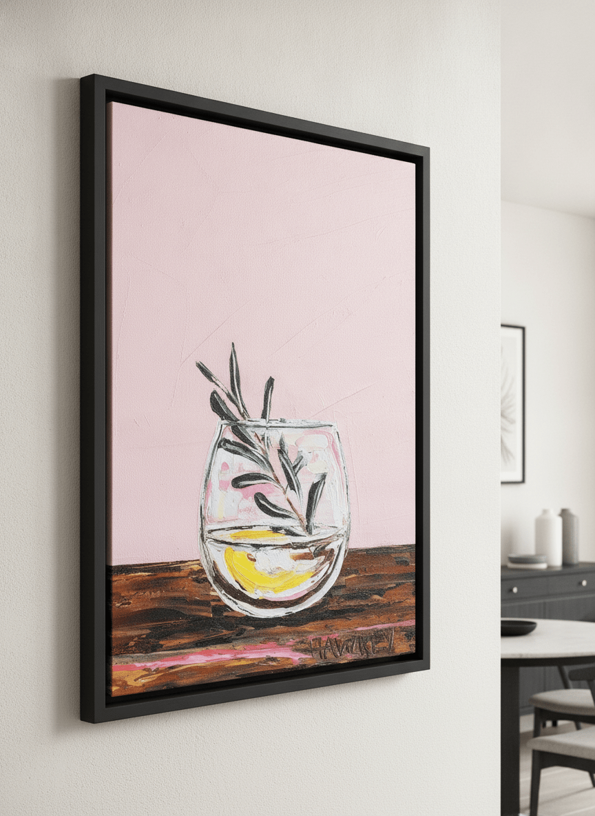 Wall art styled above a dining table in a contemporary home