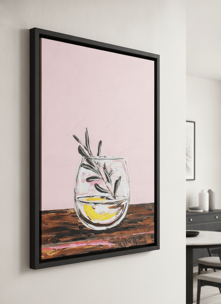 Wall art styled above a dining table in a contemporary home