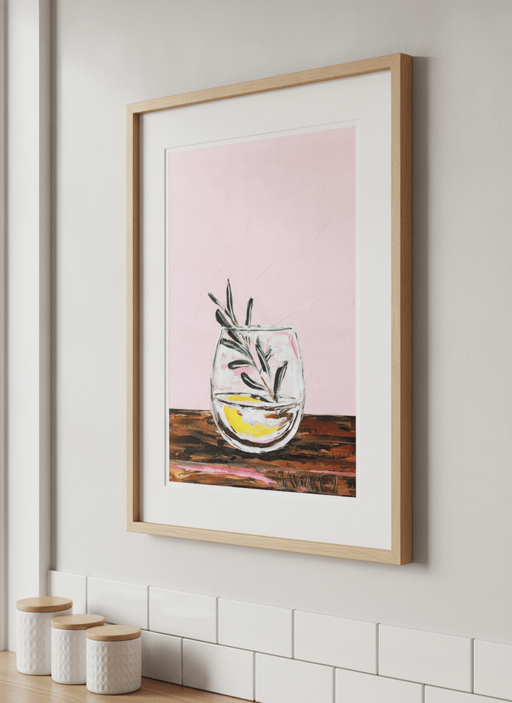 Artwork styled on the wall of a bright modern kitchen