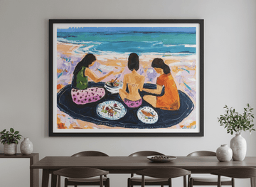 Wall art styled above a dining table in a contemporary home