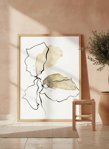 Modern wall art print leaning against the wall in a Mediterranean bathroom