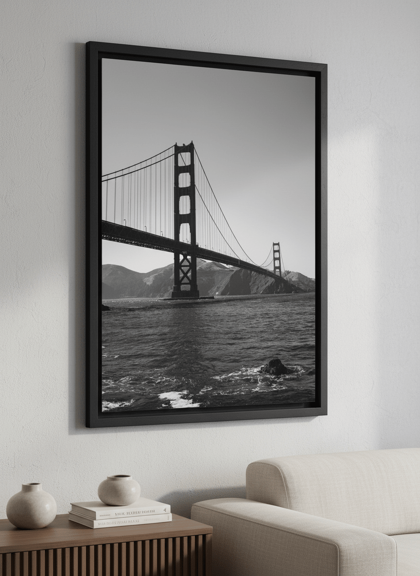 Modern wall art styled above a sofa in a neutral living room